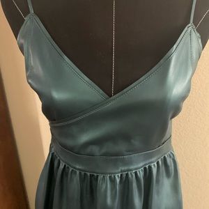 Faux leather emerald green dress.